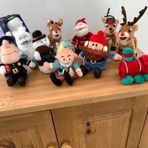 Set of Rudolph the Red Nose Reindeer plush characters.